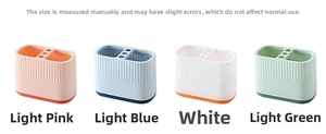 Desktop organizer showing four colors with dual compartments and circular slots