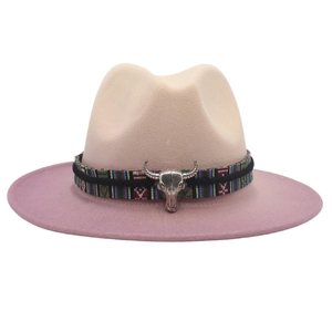 Detail of western fedora hat featuring gradient wool felt and tribal band with bull head