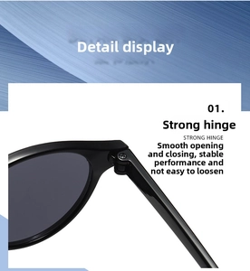 Détail de la charnière métallique et de la monture noire de ces lunettes de soleil rétro