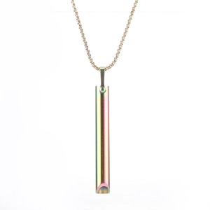 Macro shot of rainbow stainless steel meditation breathing pendant with metal chain link