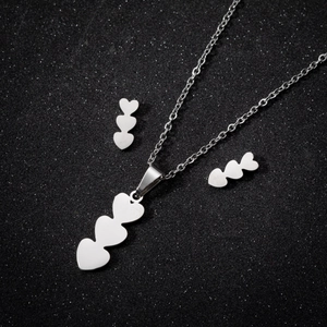 Silver stainless steel jewelry set with triple heart pendant necklace and stud earrings