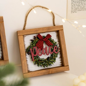 Festive Christmas wooden door sign with Peace script, buffalo plaid bow, and green wreath