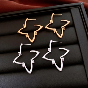 Star-shaped 18K gold plated hollow pendant earrings in gold and silver finish
