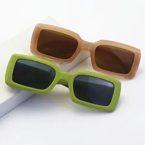 Retro square frame sunglasses in matte green and translucent brown with wide temples