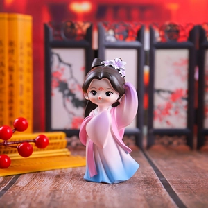 Macro shot of a cute chibi ancient lady figurine in pink and blue gradient hanfu dress