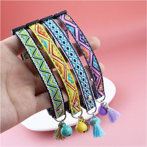 Ethnic style woven cat collars with bells and tassels in four colorful patterns