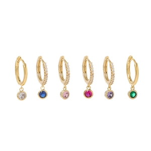Set of six gold huggie hoop earrings with colorful gemstones and pavé crystals