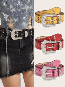 Detail of Western butterfly rhinestone belts in black, yellow, red and pink faux leather