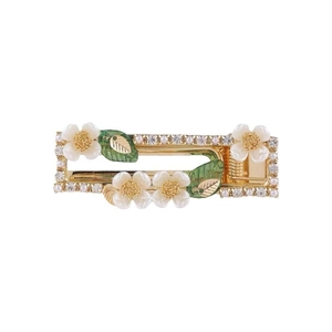 Elegant floral hair clip with white cherry blossoms, pearls and crystals on gold frame