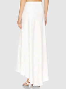 Elegant white satin maxi skirt with lace details and minimalist silhouette shown on model