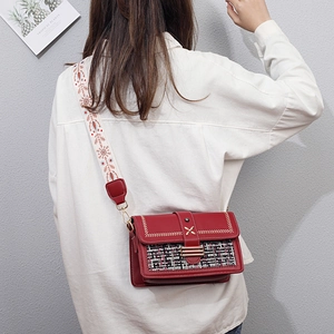 Red PU leather and tweed crossbody bag with ethnic style strap and gold hardware