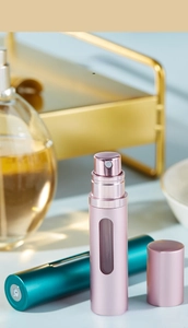 Detail showing the leak-proof seal and atomizing spray nozzle on the portable glass perfume bottle