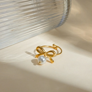 Elegant 18k gold plated stainless steel bow ring with white pearl accent for women