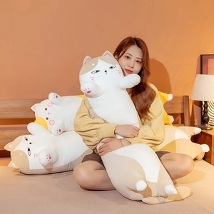 Detailed close-up of cute long cat plush pillow with soft fabric and embroidered facial details