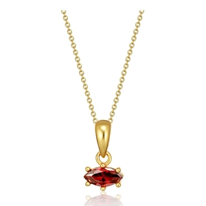 Macro detail of gold necklace featuring a red marquise cut gemstone on white background
