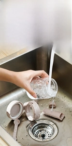Detail of detachable parts and wide opening for easy cleaning of the seasoning container