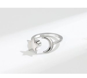Macro shot of S925 sterling silver hallmark on adjustable star and moon open ring