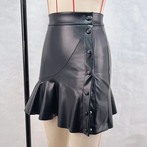 Detail view of high waist black PU leather skirt with side buttons and ruffle hem