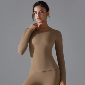 Detail view of khaki long sleeve yoga set showing high-elasticity breathable fabric texture