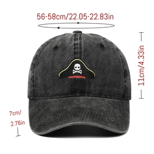 Washed dark grey cotton baseball cap featuring embroidered pirate skull with gold outlines