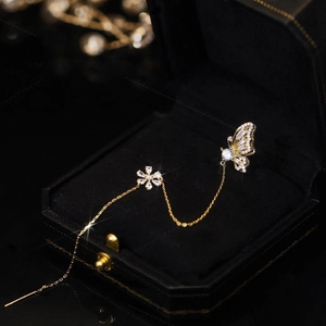 Golden butterfly and flower chain earring with zircon inlay in a black gift box