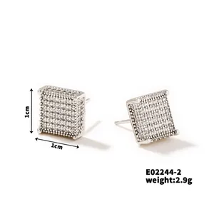 Close-up of square copper stud earrings with cubic zirconia pave setting and 1cm size details