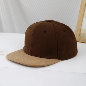 Detail view of coffee and khaki flat brim kids baseball cap with breathable eyelets