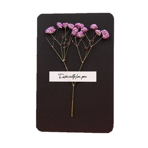 Handmade greeting card with pink dried flowers and Especially for you text on black card