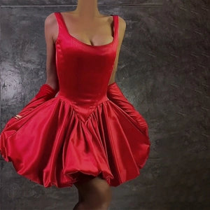 Detail of red satin strapless puff dress with matching long gloves for women