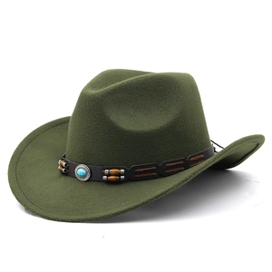 Detail of olive green wool felt cowboy hat with turquoise and leather decorative band