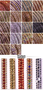 Detailed close-up of multi-colored rhinestone claw chains with various crystal settings