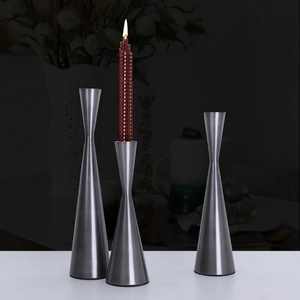 Three-piece gunmetal grey nordic iron candle holder set with elegant conical design