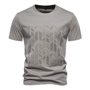Close-up of geometric arrow embroidery on men's slim fit cotton T-shirt in taupe