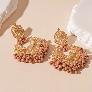 Vintage bohemian gold geometric earrings with dusty pink beaded tassels for women