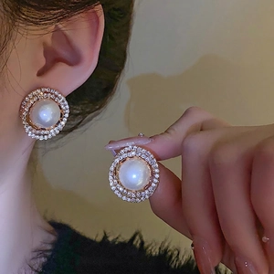 Elegant gold plated pearl stud earrings with double layered crystal halo for women