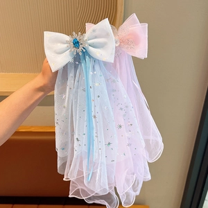 Elegant princess bow hair clips with long tulle veils in pink and blue for young girls