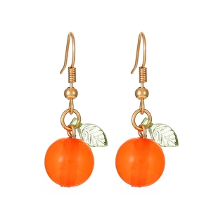 Summer style orange fruit earrings with translucent green leaves and golden hooks