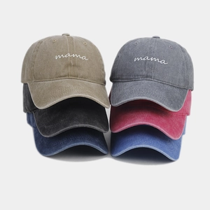 Detailed stack of six vintage washed cotton baseball caps with mama embroidery in various colors