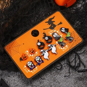 Halloween earring set with pumpkin, ghost and clown motifs on a festive display card