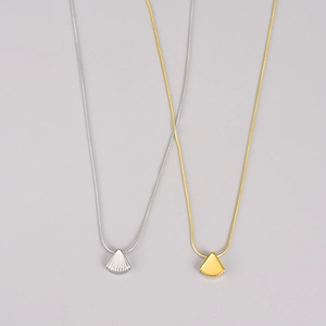 Minimalist shell pendant necklace in gold and silver finish with sleek snake chain design
