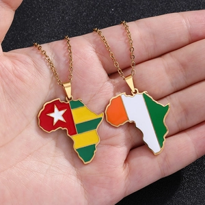 Detail view of Togo and Ivory Coast flag map pendants on gold stainless steel chains