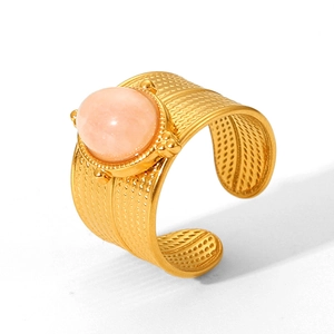 Macro view of French retro 18k gold plated stainless steel ring with pink gemstone