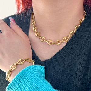 Elegant 18K gold-plated titanium steel necklace and bracelet set with geometric diamond links