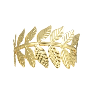 Golden metal leaf napkin ring with a creative symmetrical foliage design on white background