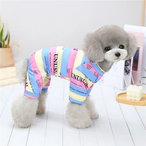 Detail of striped knit dog pajamas with elastic cuffs and cozy British home style