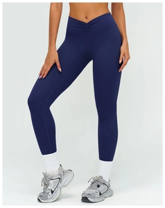 Détail du legging taille haute en V bleu marine avec tissu extensible pour le fitness