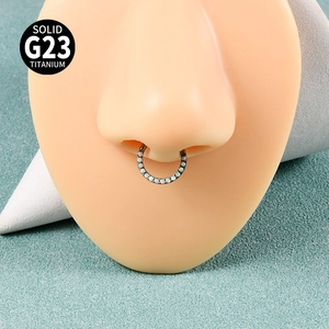 Detailed view of G23 titanium opal septum ring displayed on a realistic nose model