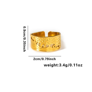 Detailed view of gold wide band ring with hammered texture and size dimensions