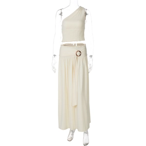 Detail of one-shoulder crop top and skirt set with metal ring buckle and waist tie