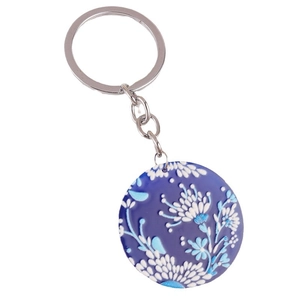 Bohemian floral acrylic keychain featuring blue and white porcelain style relief patterns